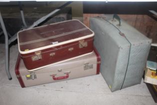 Three vintage suitcases