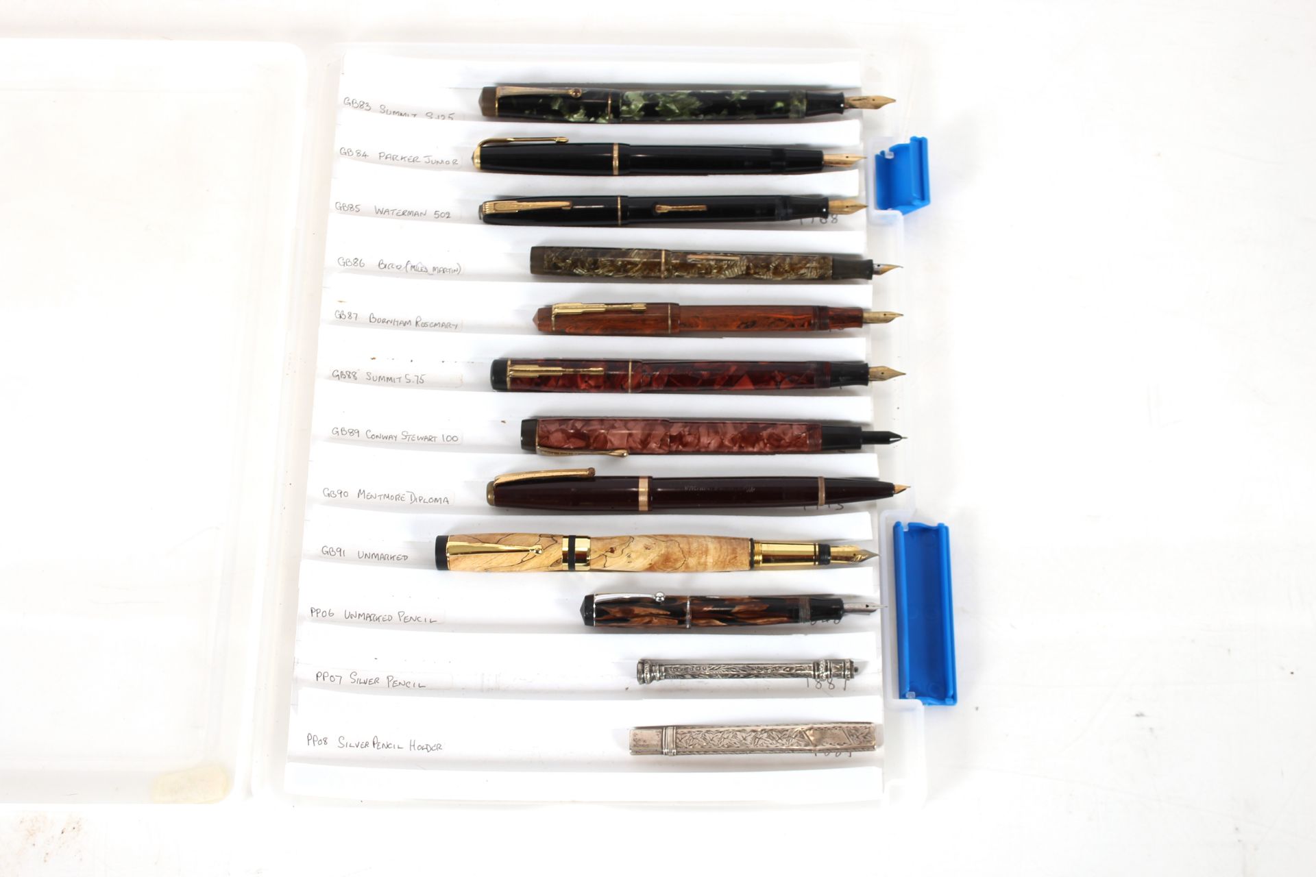 A box containing twelve various pens to include Burnham Rosemary, Waterman, Parker Junior etc.