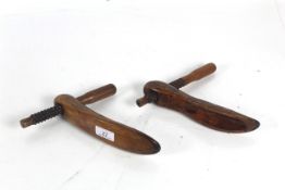 A pair of treen screw form shoe trees