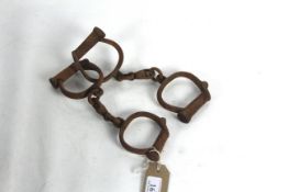 Two pairs of metal hand-cuffs