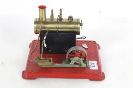 A Mamod style steam model engine of a workshop uni