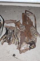 A quantity of vintage saws, hooks, hand slashers e