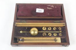 A brass cased hydrometer in fitted case, re-adjust