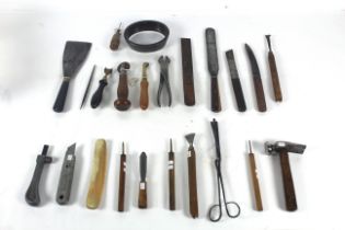 An oval knife, a quantity of book binders tools in