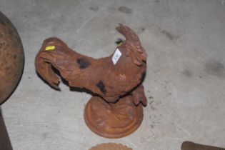 A cast iron model of a cockerel