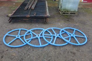 Four blue painted five spoke implement wheels