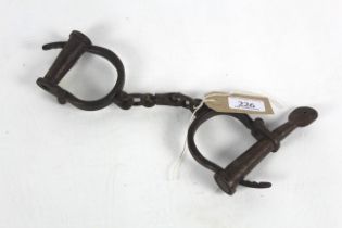 A pair of hand cuffs