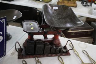 A set of vintage balance scales with original weig