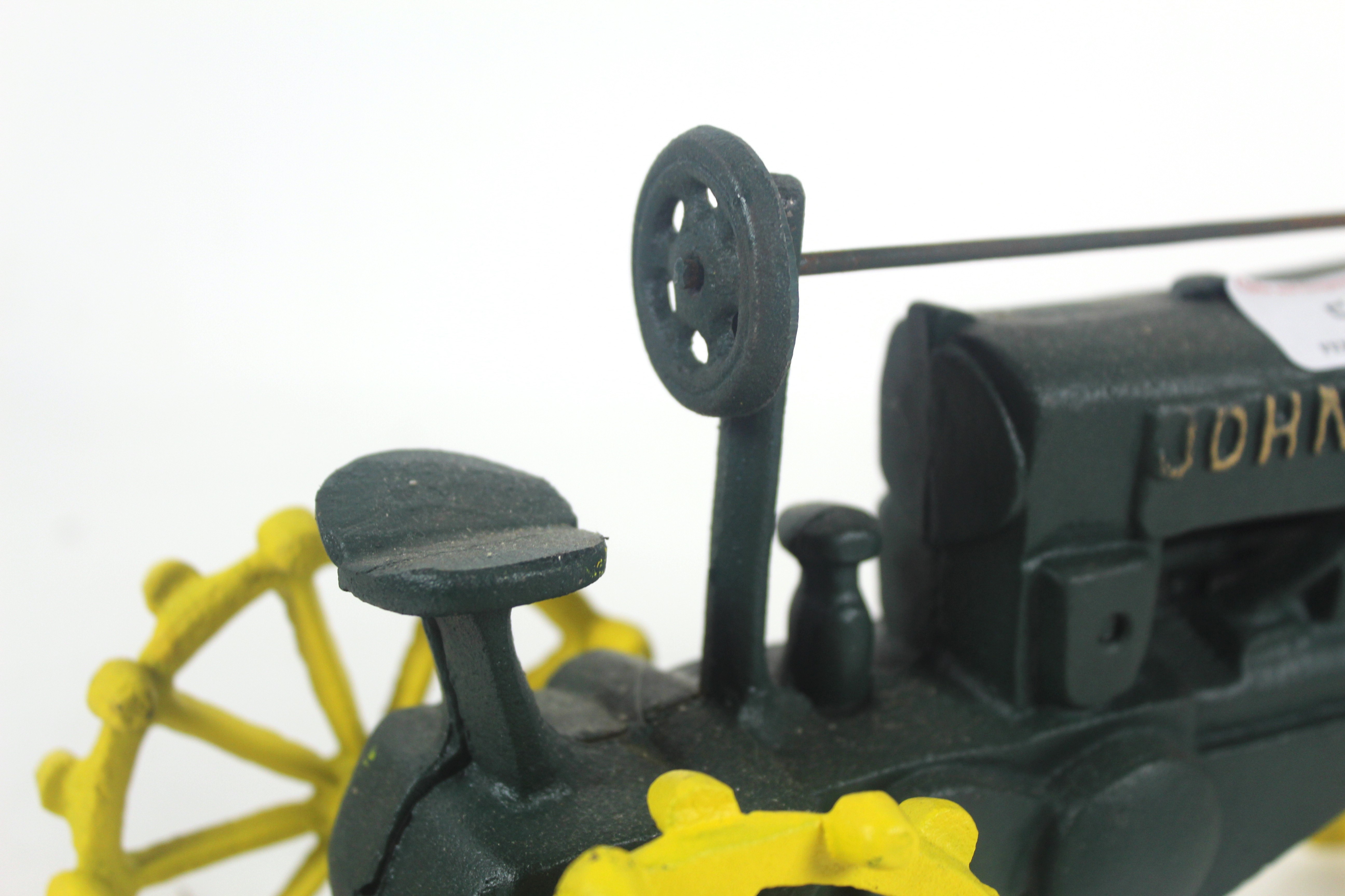 A cast iron model of a John Deere - Image 5 of 8