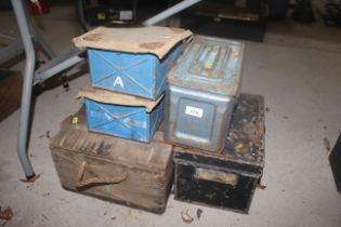 A vintage military box (A.W. Bombs) and four metal