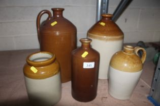 Five various stoneware bottles and jars