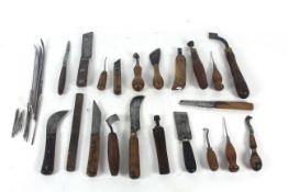 A box of shoe makers tools to include a counter kn