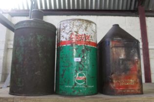 A Castrol oil can and two further oil cans