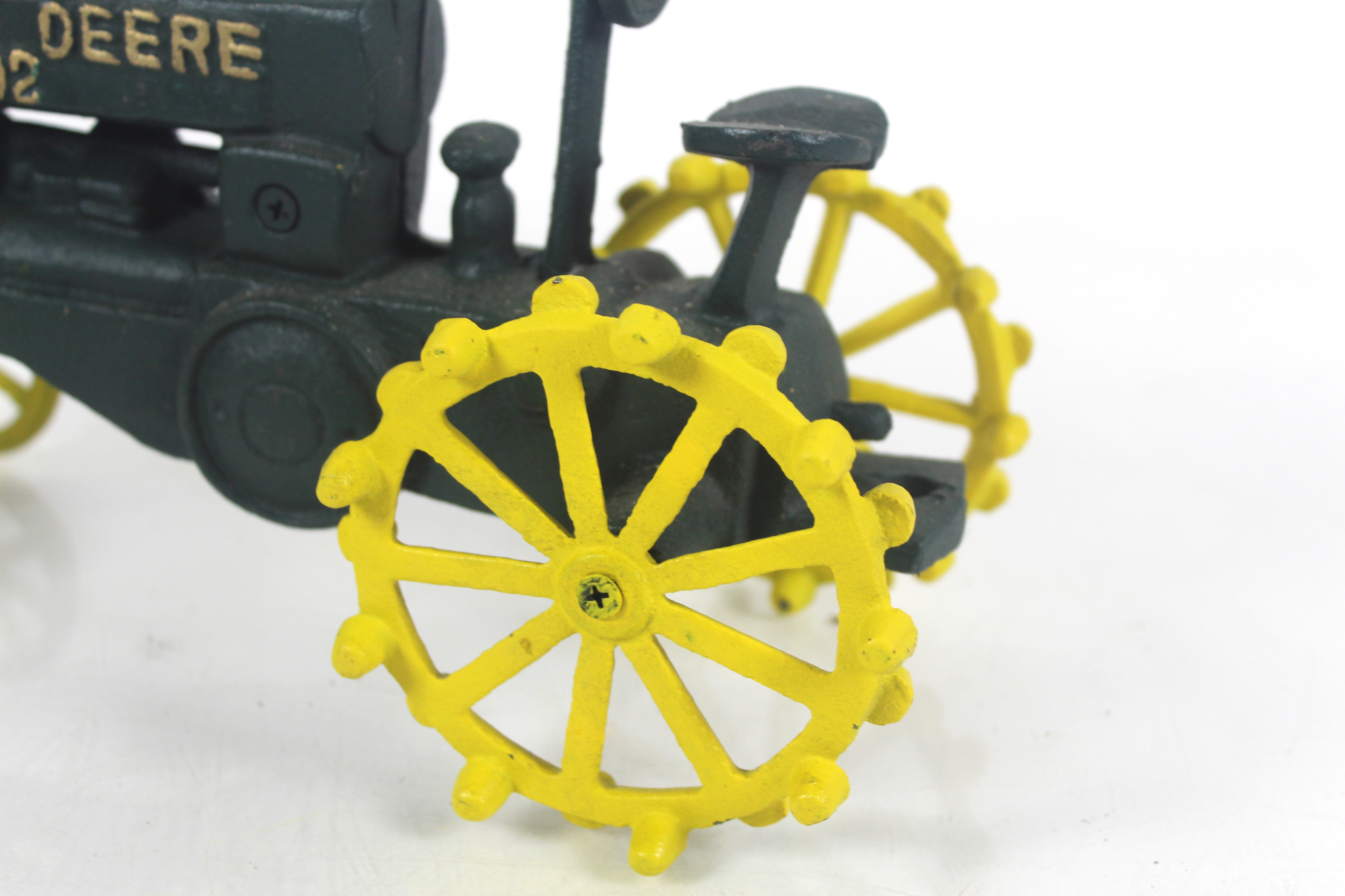 A cast iron model of a John Deere - Image 6 of 8