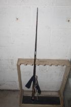 A Hardy of Alnwick two piece fishing rod with bag