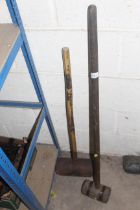 Two long handled wooden mallets