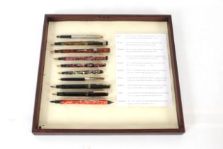 A board with ten various fountain pens including P