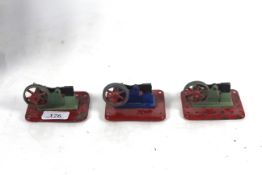 Three Mamod pulley driven steam engine hammers