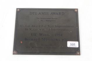 A brass sign for "The UK 1994 Winner of The DTI Amis Award From Bernard Matthews PLC" approx. 9" x