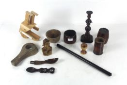 A quantity of miscellaneous treen including apple sizer, spice tower AF, spoon, small barrel, wooden