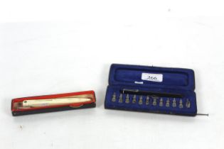 A cased Pelikan Graphos pen with nibs and an Uno Technical pen