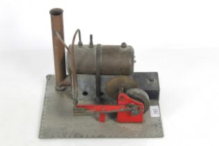 A brass mounted model steam engine with burner and