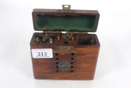 An early 20th Century Parker-Hale fitted wooden box containing a gun cleaning kit with some tools