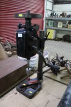 A hand pillar bench drill and a small brace drill