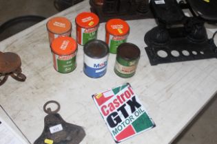 A collection of Castrol grease tins of various gra