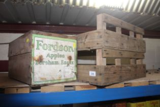 A wooden box for "Fordson Apples" from Boreham of Essex and two potato trays