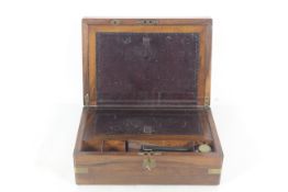 A Victorian rosewood brass mounted writing box (wi