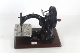 A Wilcox and Gibbs hand operated 1920's sewing mac