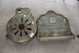 Two Blackstone & Co. cast iron items from a cake b