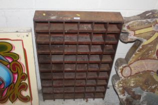 A metal nest of drawers (54 divisions), approx. 24