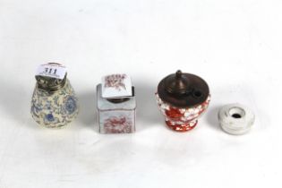 Four various ceramic and floral decorated inkwells