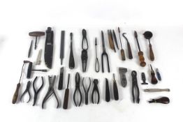 A box of miscellaneous tool to include punches, cu