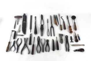A box of miscellaneous tool to include punches, cu