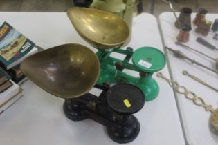 Two sets of shop scales with brass pans, one to Fr