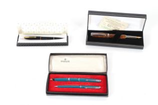 A boxed Parker fountain pen and propelling pen, a