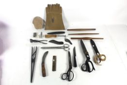 A quantity of glover's tools to include two large