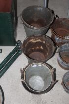 A graduated set of five pails