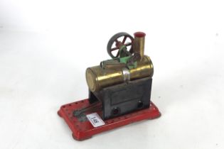 A Mamod steam engine with pulley and burner