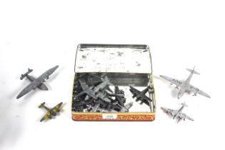 A box of various model military planes etc.