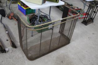 A large brass and wirework fireguard, approx. 39"