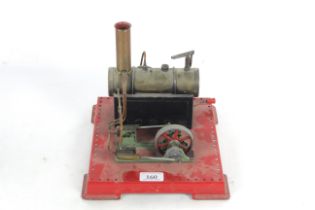 A Mamod model steam engine with burner and pulley