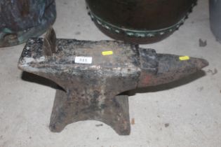 A small farriers anvil with a cutter tool