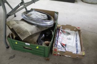 Two boxes containing motor parts (Mercedes trims a