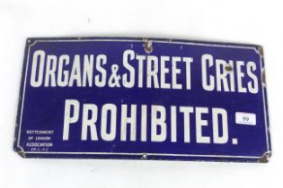 An enamel sign for "Organs and Street Cries Prohib