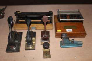 Three hand stamps, two various hole punches and a