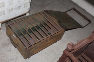 A vintage portable gas Army stove